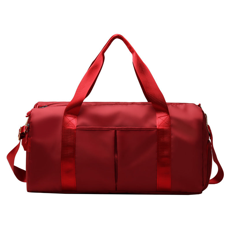 Red duffel bag on a white background